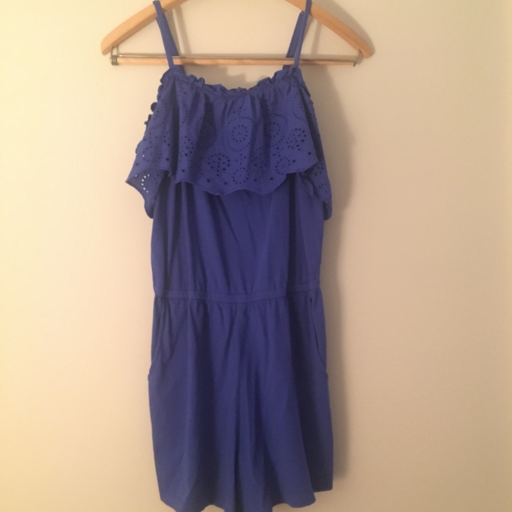 Girl’s blue romper.